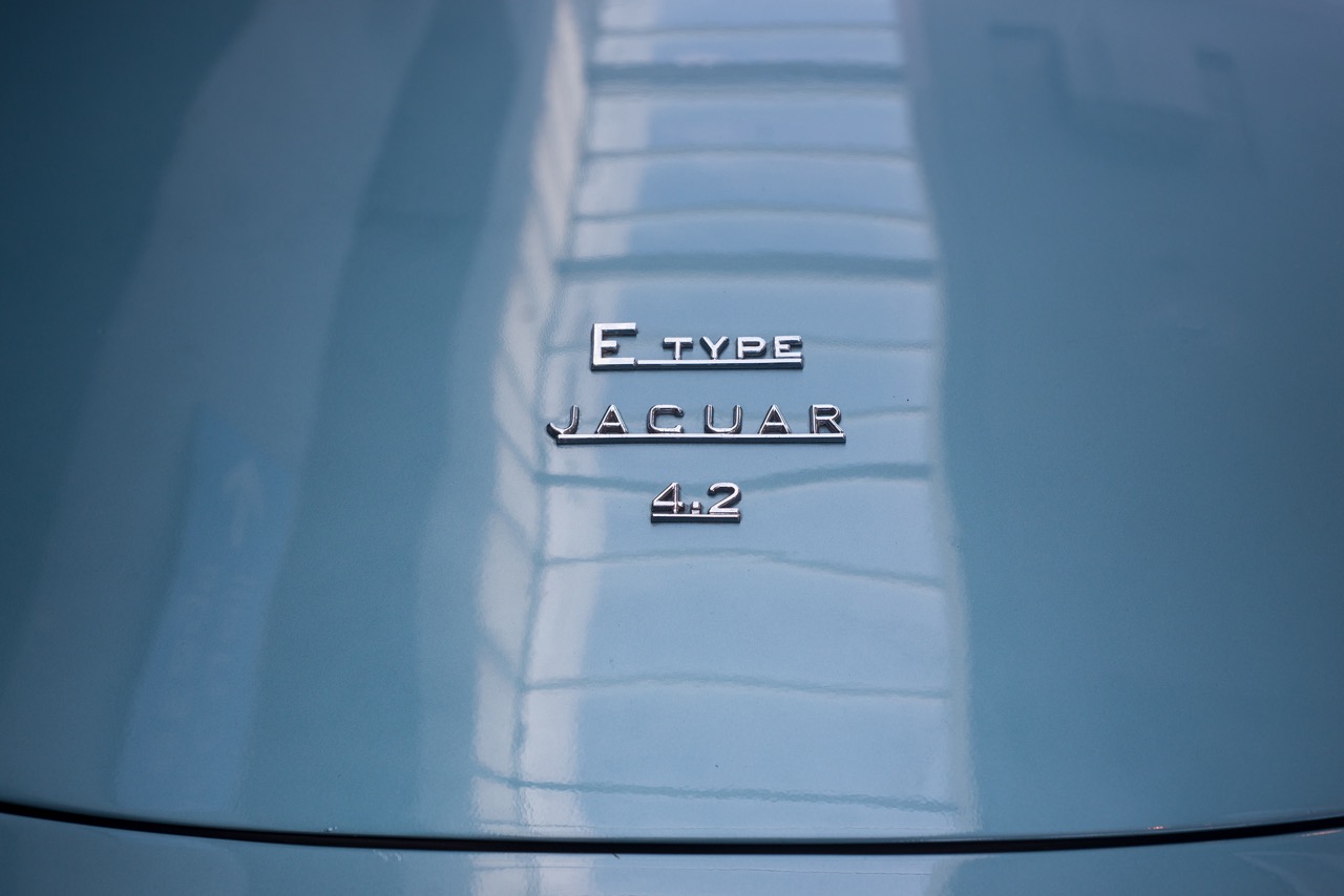 Mulhouse - France - 13 September 2020 - Closeup of sign of vintage Jaguar E-TYPE parked in the street